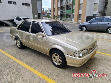 Mazda 323 2001 - imagen 1