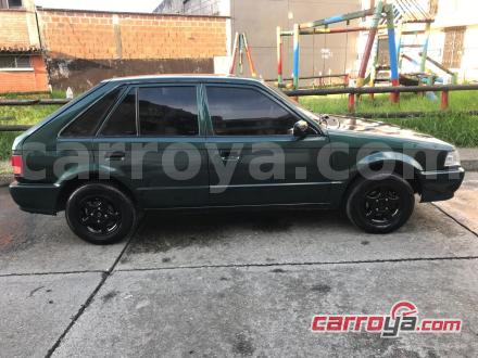 Mazda 323 2001 - imagen secundaria 2