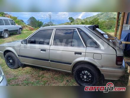 Mazda 323 1995 - imagen secundaria 1