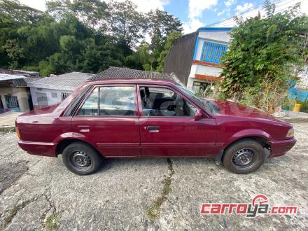 Mazda 323 2003 - imagen secundaria 2